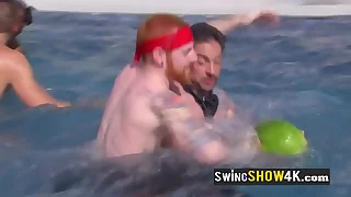 A powered group of swingers is having fun carrying-on naked in the water&period;